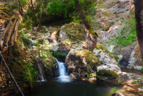 Beautiful view of a waterfall at the Valley of the Butterflies in Petaloudes on the Island of Rhodes, Greece