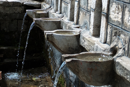 View of water taps at the village of Vourgareli, Tzoumerka, Epirus, Greece