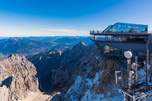 Top of Germany's highest peak-Zugspitze. The Zugspitze is the highest mountain in Germany and 2962m above sea level. We can see 360 degrees panorama and 400 mountain peaks in four countries, Bavaria, Germany