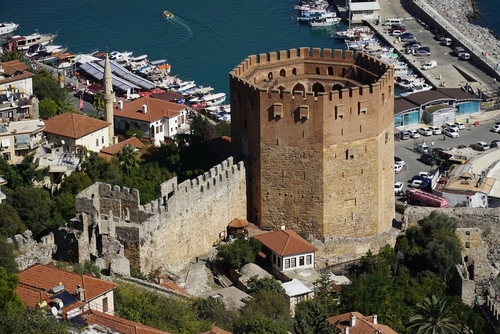 The Red Tower, famous octagonal building from the 13th century in the harbor of the historic town of Alanya, Antalya region, Turkey