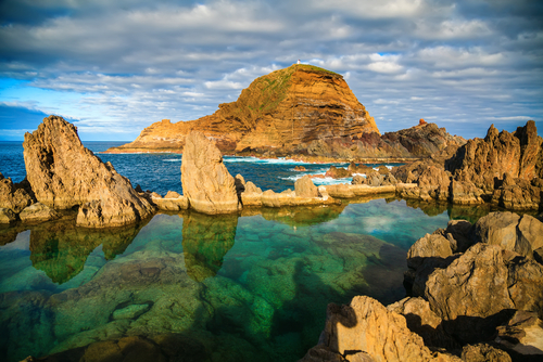 natural swimming pools of volcanic lava in Porto Moniz, Madeira island, Portugal families will enjoy the great experience
