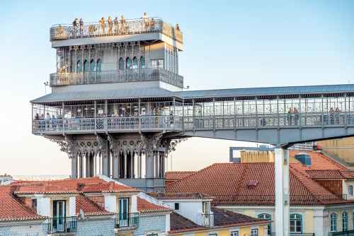 View of the historic architecture of Lisbon in Portugal showcasing The Elevador de Santa Justa Lift on a sunny day in Lisbon, Portugal