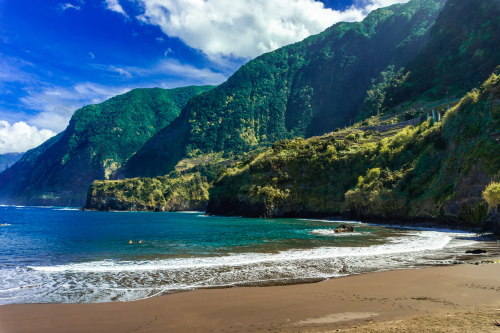 Praia do Cais, black sand Beach in Seixal on Madeira Island, Portugal