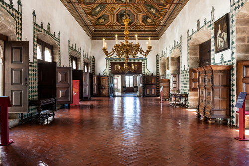 Beautiful view to furniture and roof art work inside palace room in Sintra's National Palace, Sintra, Portugal