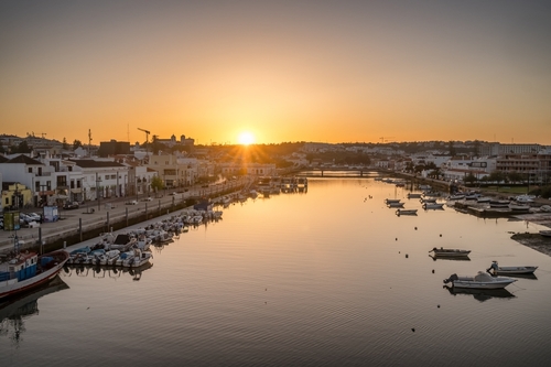 Picturesque Portuguese Tavira town at sunset, Algarve Region, Portugal
