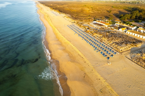 Sand dunes of Praia do Barril beach near Tavira, Algarve, Portugal