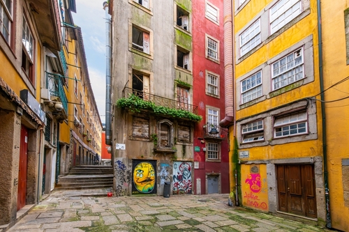 The narrow, colorful hillside alleys and streets in the historic Ribeira district of Porto, Portugal